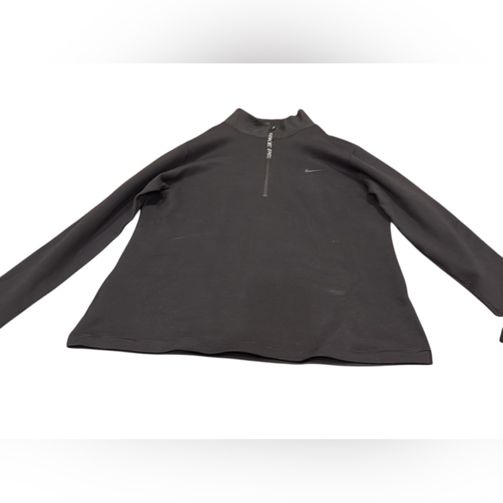 Peloton Nike with Peloton Nikepro  dri-fit long sleeve top host pick
